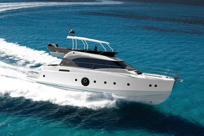 Slide: The Image of 2017 Beneteau Monte Carlo MC6 yacht cruising on clear blue water. - 4