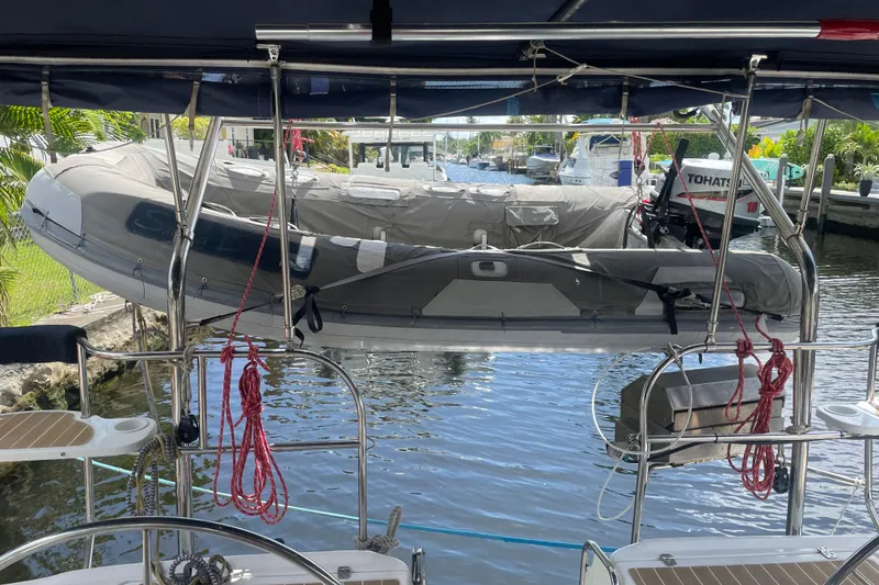 Slide: The Image of Inflatable dinghy on a 2010 Hunter 49 Aft Cockpit yacht, docked by a canal. - 38
