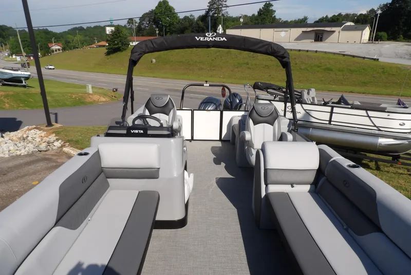 Slide: The Image of 2025 Veranda VISTA SPORT 22 pontoon boat with sleek seating and modern design. - 12