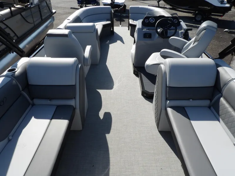 Slide: The Image of 2025 Veranda VISTA SPORT 22 pontoon boat interior with luxurious seating and modern helm. - 16