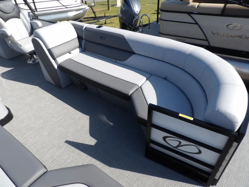 Slide: The Image of 2025 Veranda VISTA SPORT 22 boat interior with gray seating and modern design. - 5