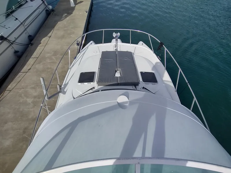 Slide: The Image of 2005 Glacier Bay 3490 Ocean Runner docked at marina, aerial view. - 30