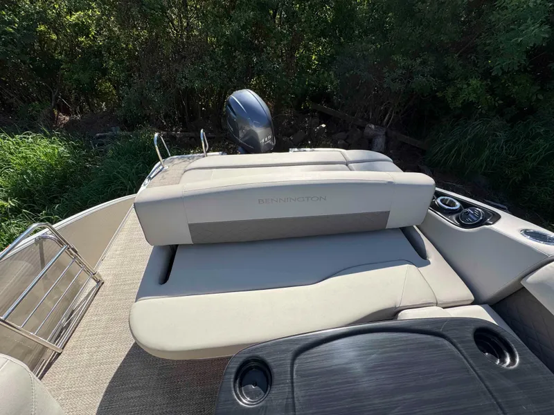 Slide: The Image of 2018 Bennington SX 22 SSBXP boat interior with plush seating and sleek design. - 23