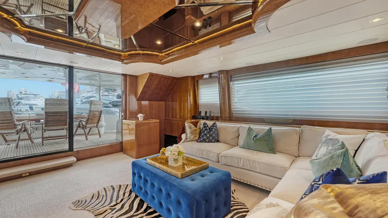 Slide: The Image of Luxurious interior of a 2007 Horizon 95 yacht with elegant seating and decor. - 13