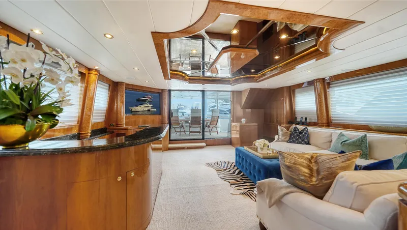 Slide: The Image of Luxurious interior of 2007 Horizon 95 yacht with elegant furnishings and panoramic windows. - 14