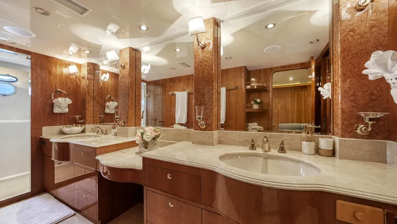 Slide: The Image of Luxurious bathroom on 2007 Horizon 95 yacht with elegant wood and marble finishes. - 28