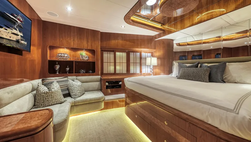 Slide: The Image of Luxurious 2007 Horizon 95 yacht interior with elegant wood finishes and cozy seating area. - 32