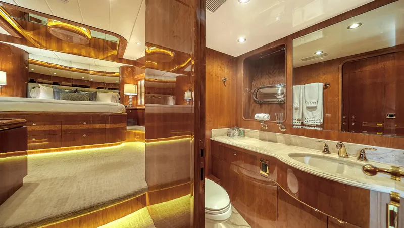 Slide: The Image of Luxurious 2007 Horizon 95 yacht interior with elegant wood finishes and modern amenities. - 39