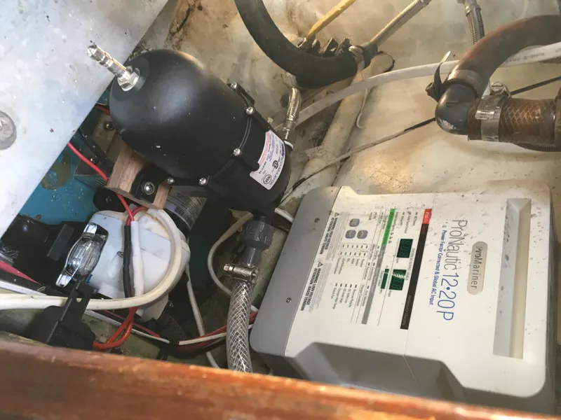 Slide: The Image of Engine compartment of a 1974 Cheoy Lee Clipper Ketch with ProMariner ProNautic 1220P charger. - 14