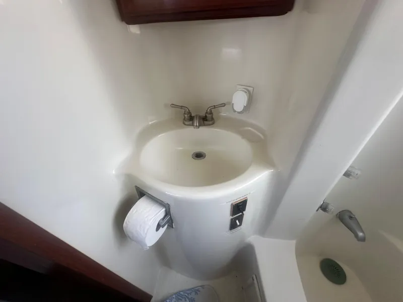 Slide: The Image of Compact bathroom sink in 1989 Bluewater 51' Coastal Cruiser yacht. - 26