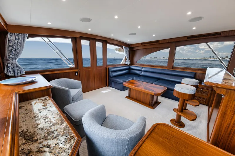 Slide: The Image of Luxurious 2011 Jim Smith Custom Sportfish yacht interior with elegant wood finishes and ocean view. - 26
