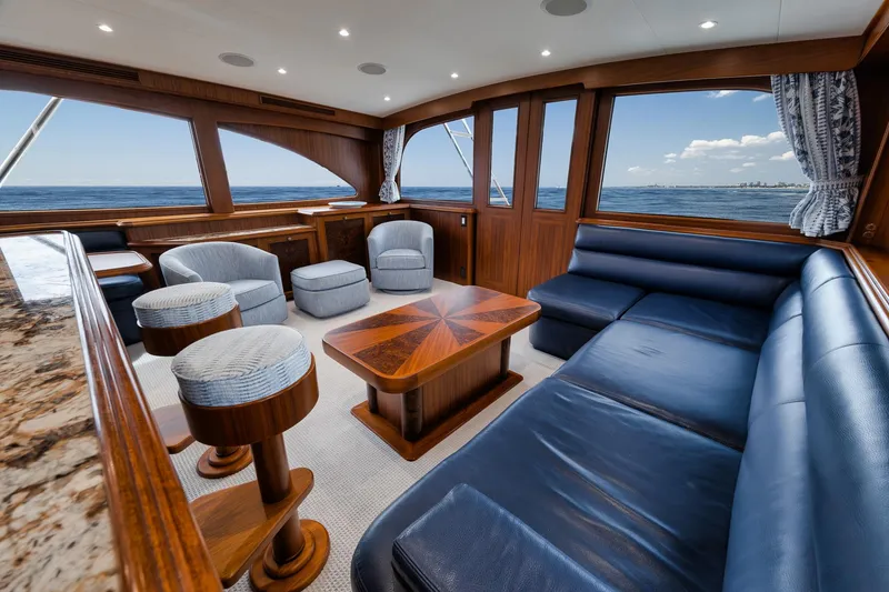 Slide: The Image of Luxurious 2011 Jim Smith Custom Sportfish yacht interior with elegant wood and leather furnishings. - 27