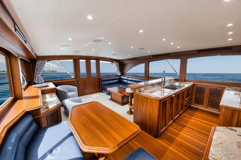 Slide: The Image of Luxurious interior of 2011 Jim Smith Custom Sportfish yacht with elegant wood finishes and ocean view. - 33