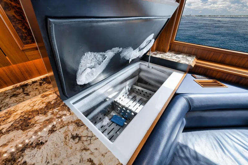 Slide: The Image of Open freezer on 2011 Jim Smith Custom Sportfish yacht with luxurious interior and ocean view. - 37