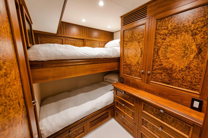 Slide: The Image of Luxurious wooden cabin interior with bunk beds on a 2011 Jim Smith Custom Sportfish yacht. - 38