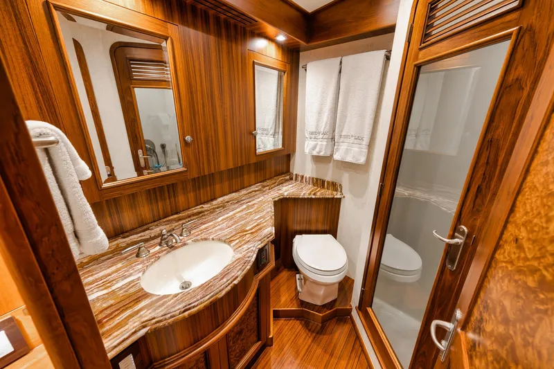 Slide: The Image of Luxurious bathroom in 2011 Jim Smith Custom Sportfish yacht with wood accents and modern fixtures. - 44