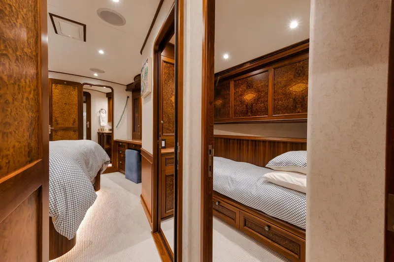 Slide: The Image of Luxurious cabin interior of 2011 Jim Smith Custom Sportfish yacht, featuring elegant wood finishes. - 46