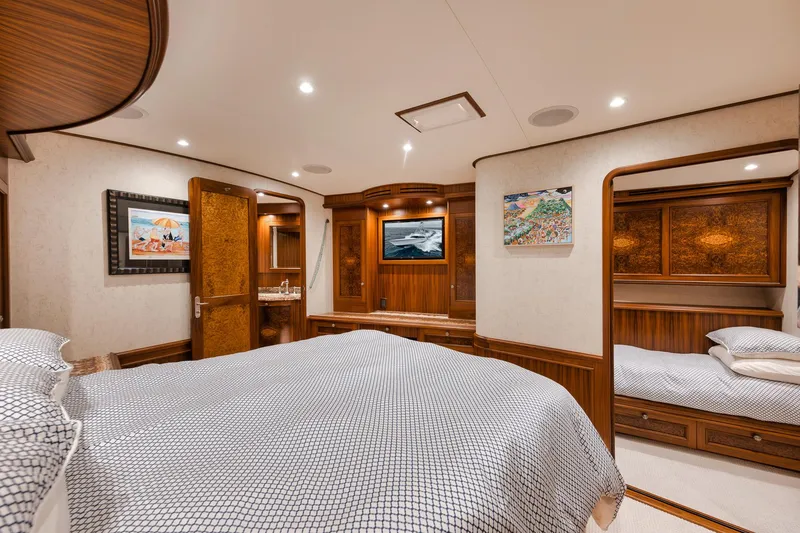 Slide: The Image of Luxurious cabin interior of 2011 Jim Smith Custom Sportfish yacht with elegant wood finishes. - 49
