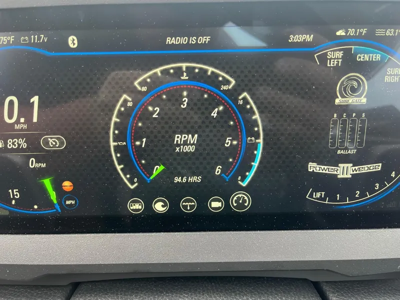 Slide: The Image of Dashboard of 2022 Malibu Wakesetter 23 LSV showing RPM, speed, and ballast settings. - 14