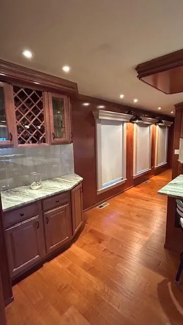 Slide: The Image of Luxurious 2007 Sharpe 18 x 85 houseboat interior with elegant wood flooring and cabinetry. - 10