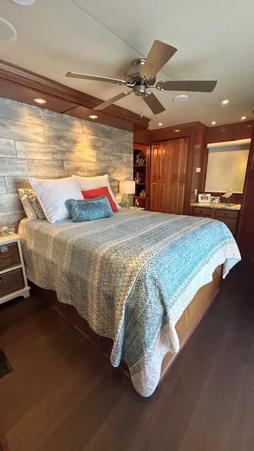 Slide: The Image of Cozy bedroom in 2007 Sharpe 18 x 85 houseboat with modern decor and ceiling fan. - 20