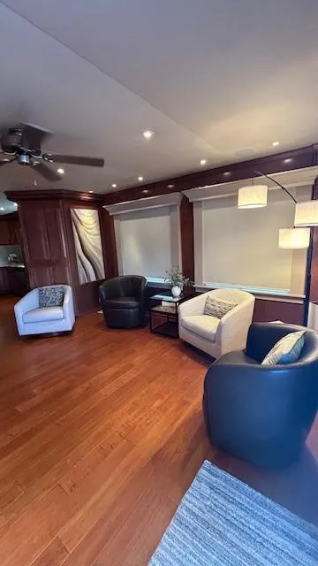 Slide: The Image of Luxurious interior of 2007 Sharpe 18 x 85 houseboat with modern seating and wooden flooring. - 4