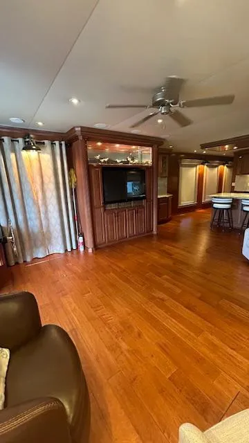 Slide: The Image of Interior of 2007 Sharpe 18 x 85 Houseboat with wood flooring and modern amenities. - 5