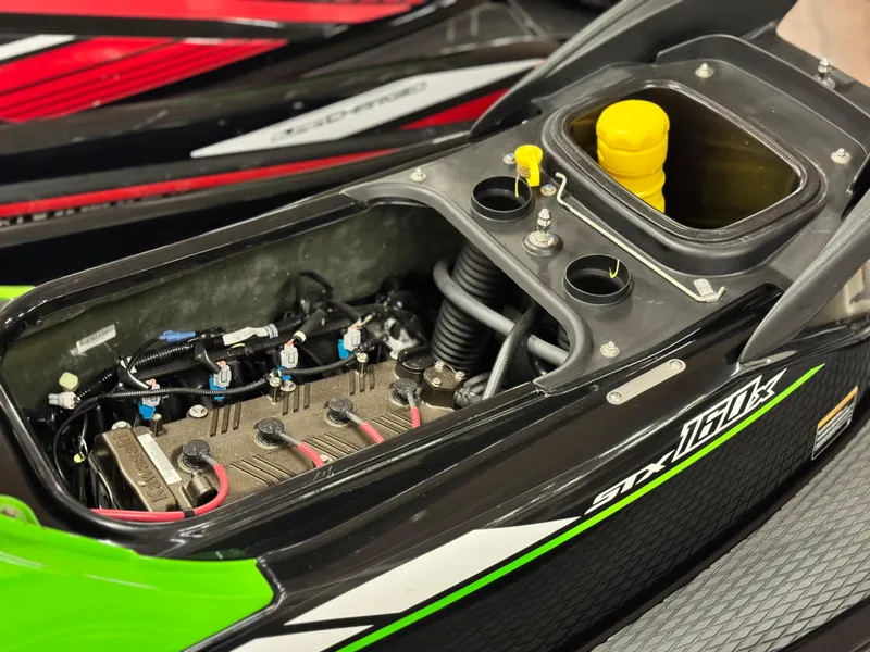 Slide: The Image of 2023 Kawasaki Jetski STX 160X engine compartment, showcasing internal components and design. - 11
