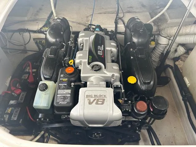Slide: The Image of Engine compartment of a 2013 Rinker 290 Express Cruiser with a Big Block V8 engine. - 10