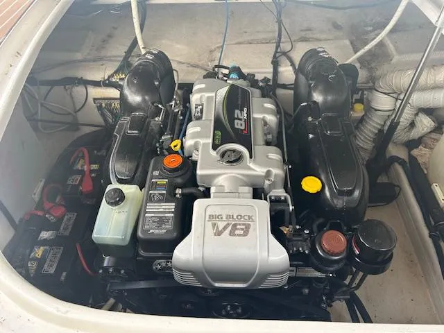 Slide: The Image of Engine compartment of a 2013 Rinker 290 Express Cruiser with a Big Block V8 engine. - 9