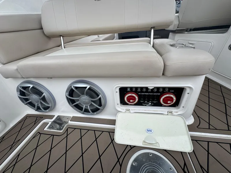 Slide: The Image of 2011 Regal 35 Express Cruiser interior with speakers and control panel. - 25