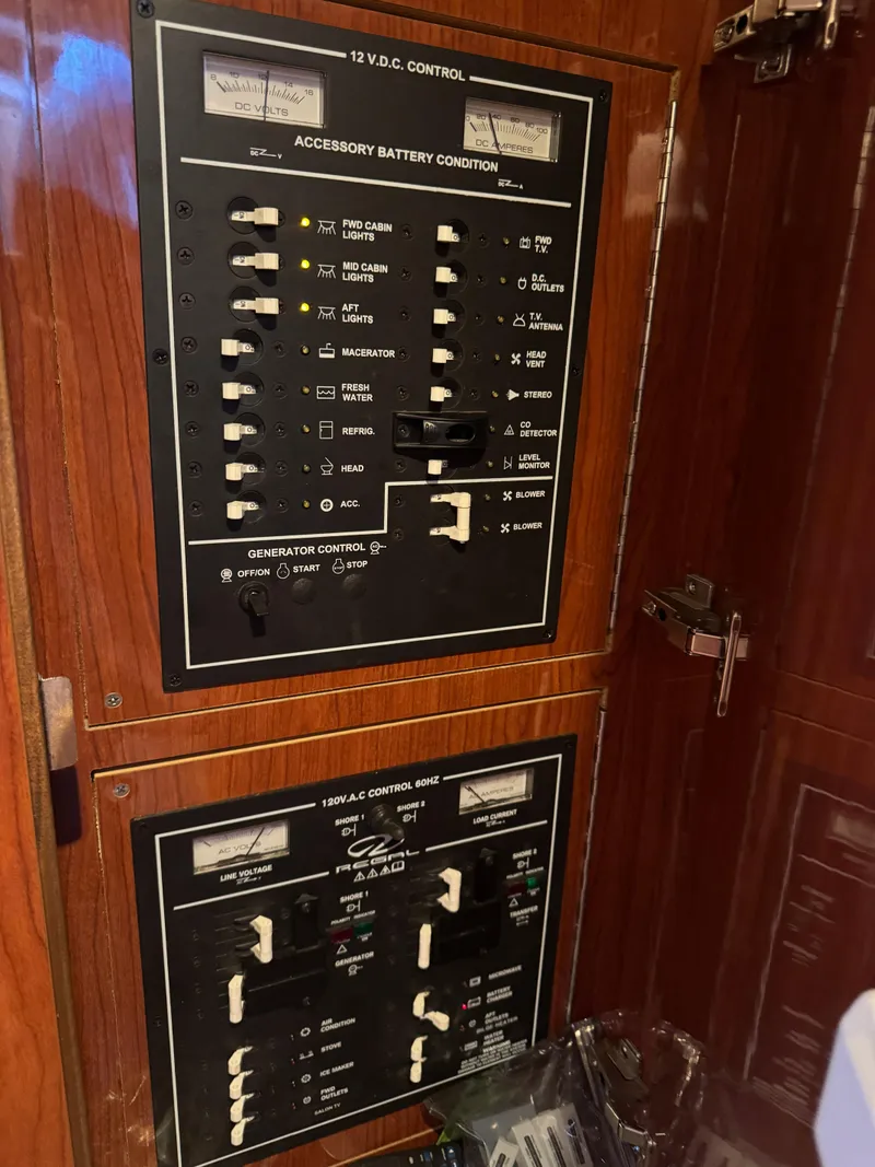Slide: The Image of Control panel of a 2011 Regal 35 Express Cruiser boat. - 44