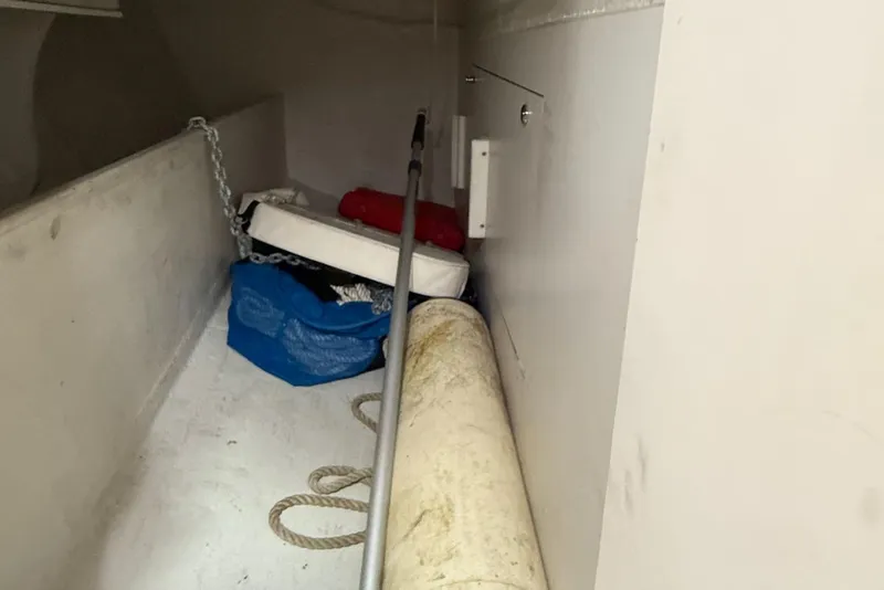 Slide: The Image of Storage compartment of a 2005 J Boats J/124 with sailing gear and equipment. - 28