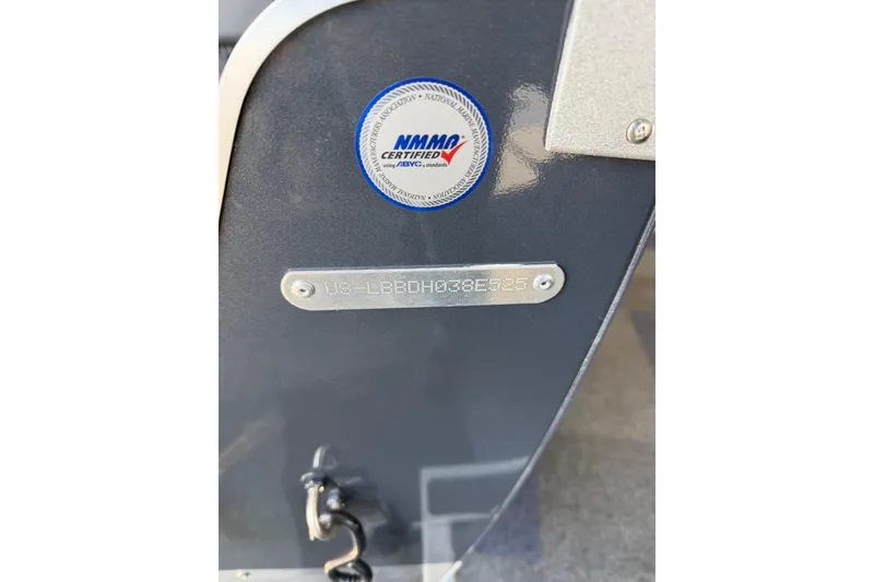 Slide: The Image of 2025 Lund 1675 Alaskan SS boat with NMMA certification label and serial number plate. - 13