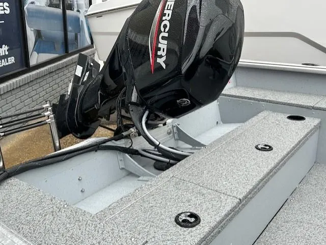 Slide: The Image of 2025 Lund 1675 Alaskan SS boat with Mercury outboard motor, interior view. - 5