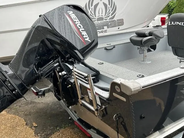 Slide: The Image of 2025 Lund 1675 Alaskan SS boat with Mercury outboard motor, rear view. - 6