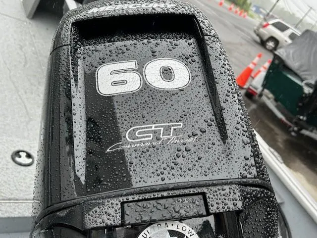 Slide: The Image of 2025 Lund 1675 Alaskan SS boat engine with raindrops, featuring 60 CT Command Thrust. - 7