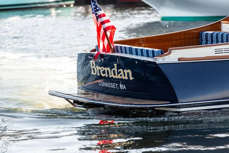 Slide: The Image of Hinckley Picnic Boat 37 MKIII, 2018, with American flag, named "Brendan," in Cohasset, MA waters. - 26