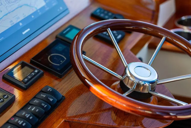 Slide: The Image of Steering wheel and controls of 2018 Hinckley Picnic Boat 37 MKIII. - 39
