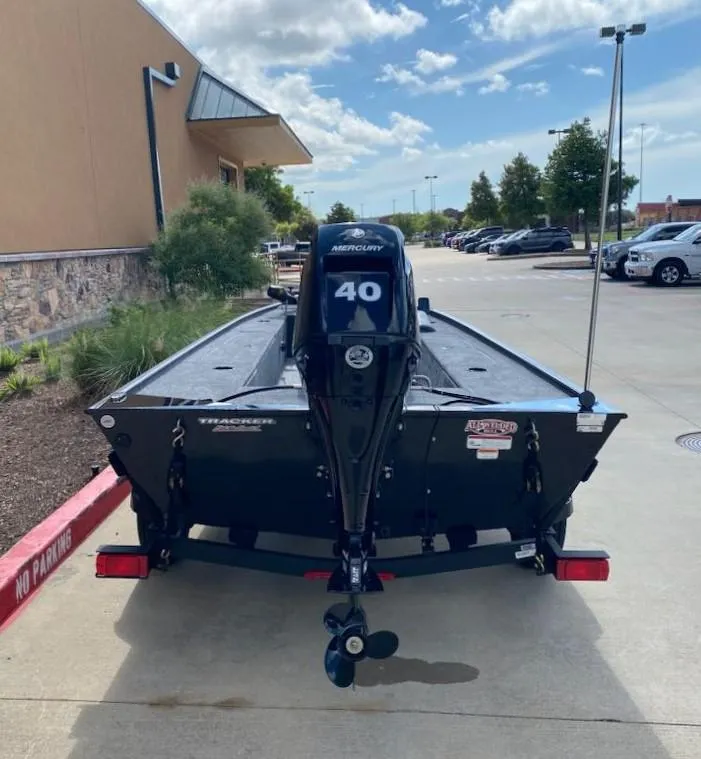 Slide: The Image of 2025 Tracker Panfish 17 boat with Mercury 40 engine in parking lot. - 7