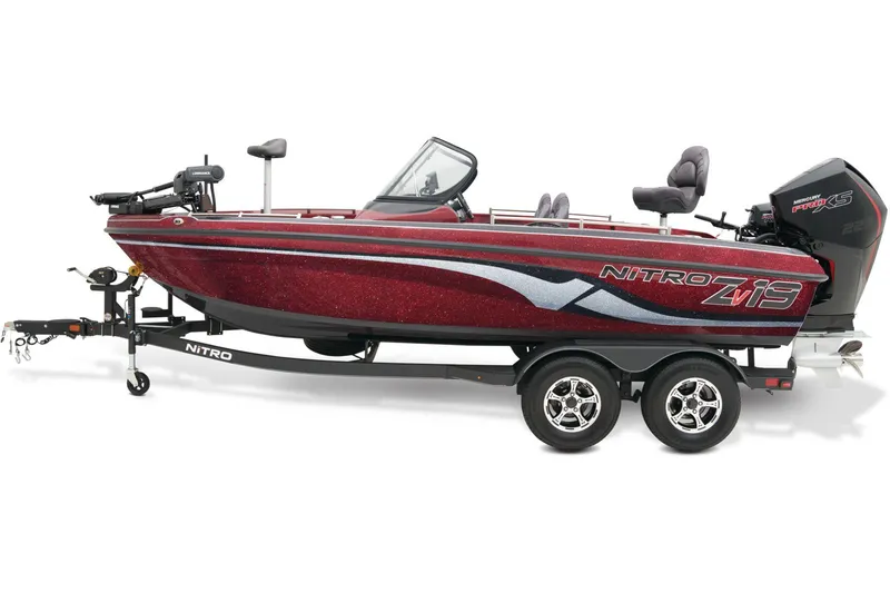 Slide: The Image of 2025 Nitro ZV19 Pro boat displayed indoors with a red bow. - 1
