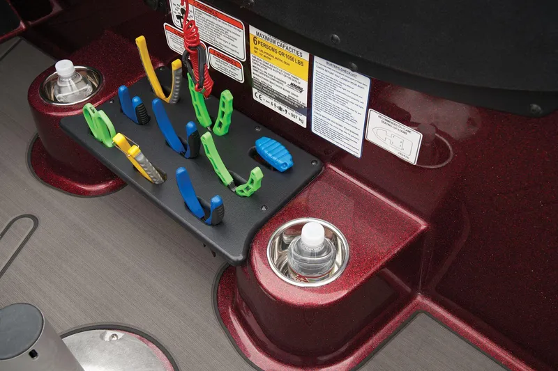 Slide: The Image of 2025 Nitro ZV19 Pro boat interior with fishing gear and promotional display. - 16