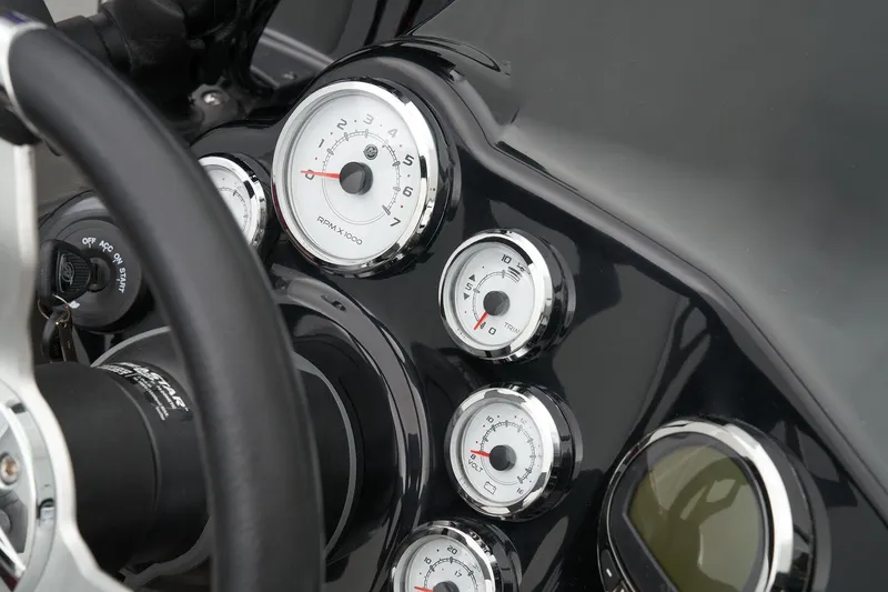 Slide: The Image of 2025 Nitro ZV19 Pro boat displayed in showroom with off-road vehicles. - 17