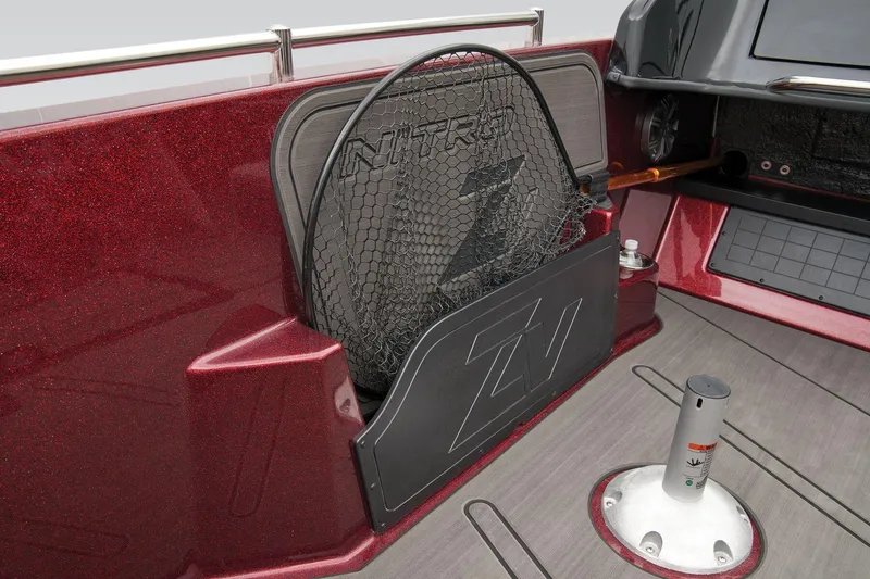 Slide: The Image of Control panel of 2025 Nitro ZV19 Pro boat with cables and textured surface. - 21