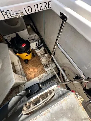 Slide: The Image of Interior view of a 2009 Marine Trader 36 Euro Sedan boat with cleaning equipment. - 26