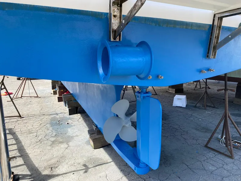 Slide: The Image of 2009 Marine Trader 36 Euro Sedan boat hull and propeller in dry dock. - 28