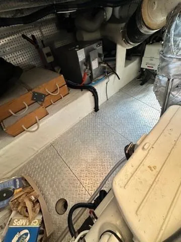 Slide: The Image of Engine room of 2009 Marine Trader 36 Euro Sedan with equipment and storage. - 47