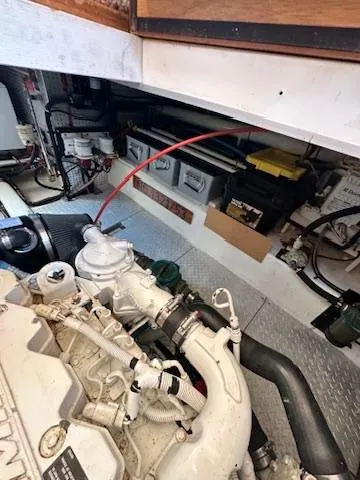 Slide: The Image of Engine room of 2009 Marine Trader 36 Euro Sedan with visible components and wiring. - 48