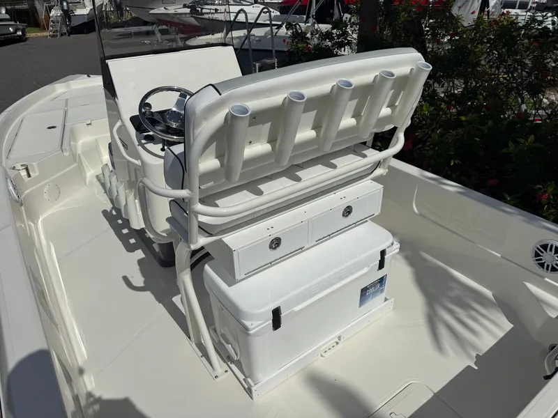 Slide: The Image of 2025 Skeeter SX 230 boat interior with seating and storage compartments. - 14