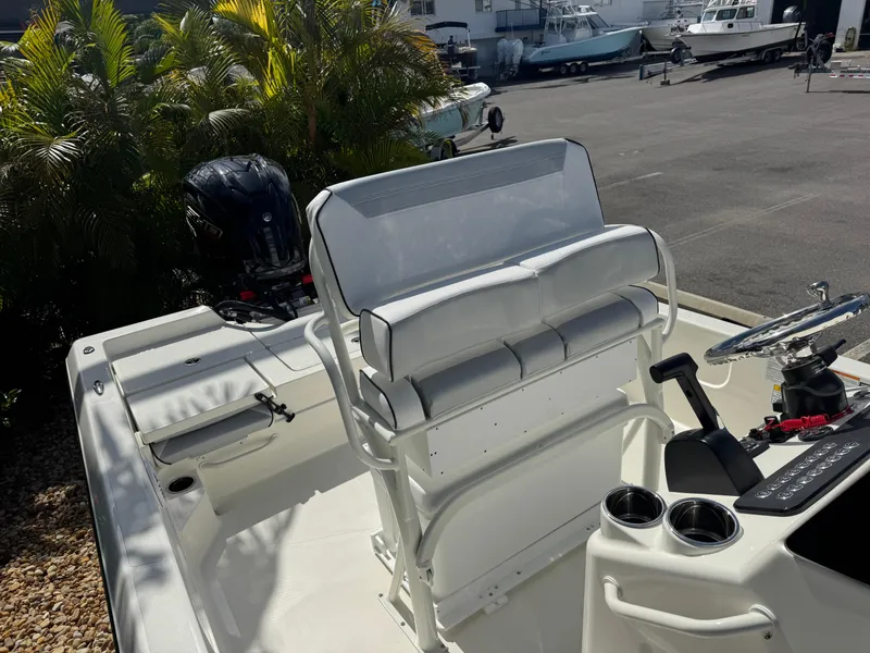 Slide: The Image of 2025 Skeeter SX 230 boat interior with seating and control panel. - 25